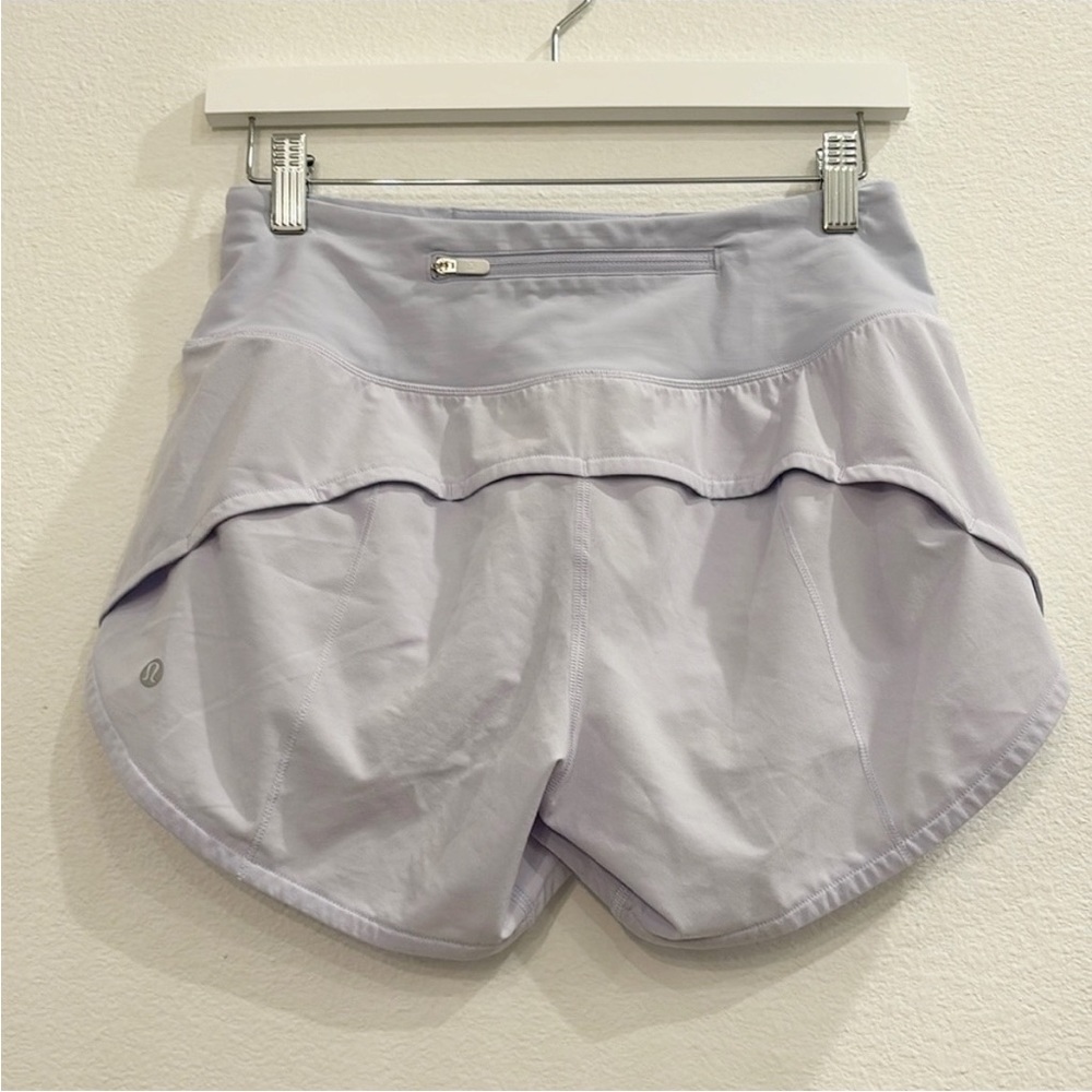 Lululemon Speed Up Mid-Rise Lined Short 4"
Pastel Blue ( lilac) light purple 4